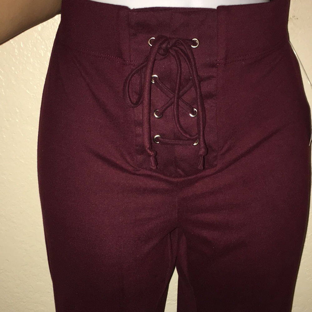 Lace up elastic waist band with grommets flare leg